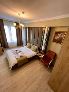 Postel nebo postele na pokoji v ubytování New Taksim Hotel