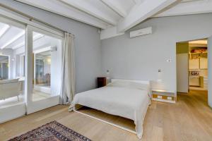 Ένα ή περισσότερα κρεβάτια σε δωμάτιο στο Fantoni Loft