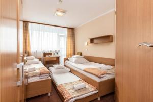 Postel nebo postele na pokoji v ubytování Ziemowit + 37 fotografií