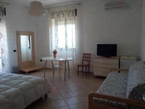 TV a/nebo společenská místnost v ubytování B&B Ore Liete