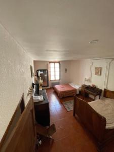 Chambres d' hôtes l'Escalo à Moutiers-Ste-Marie (04360)客房内的一张或多张床位