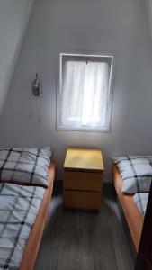 Krevet ili kreveti u jedinici u okviru objekta domek w Głębinowie
