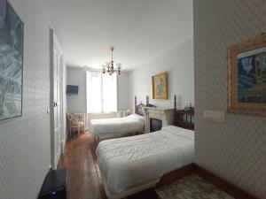 Postel nebo postele na pokoji v ubytování Hotel Ormazabal