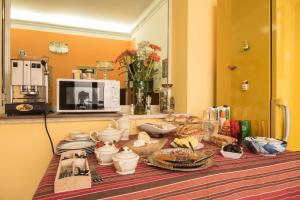 Kuchyň nebo kuchyňský kout v ubytování B&B Via Roma