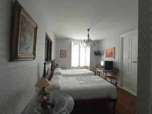 Postel nebo postele na pokoji v ubytování Hotel Ormazabal