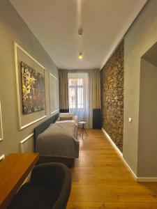 Posteľ alebo postele v izbe v ubytovaní Kalix Boutique Hotel