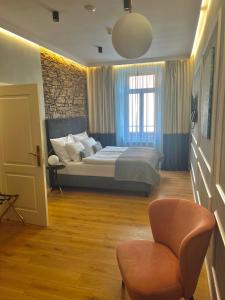 Posteľ alebo postele v izbe v ubytovaní Kalix Boutique Hotel