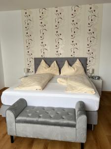 A bed or beds in a room at Postwirt