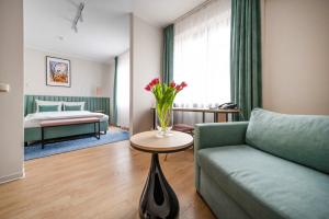 Posteľ alebo postele v izbe v ubytovaní Hotel H12****