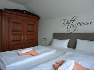 Postel nebo postele na pokoji v ubytování Ferienwohnung O8