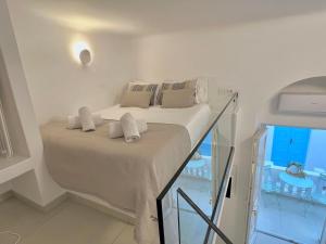 Postel nebo postele na pokoji v ubytování Thanos Place Mykonos Town by DiVal Properties