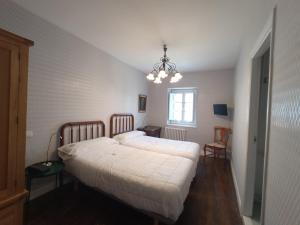 Postel nebo postele na pokoji v ubytování Hotel Ormazabal
