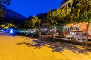 a street in a town at night at Sheriff, Olympos in Kumluca
