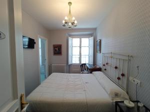 Postel nebo postele na pokoji v ubytování Hotel Ormazabal