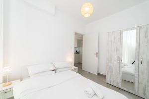 Postel nebo postele na pokoji v ubytování Kleoniki & Irida Residential Complexes