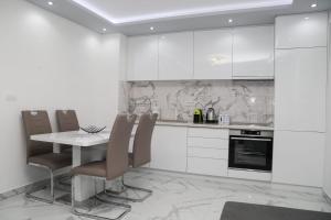 Kuchyň nebo kuchyňský kout v ubytování Apartman Viktor
