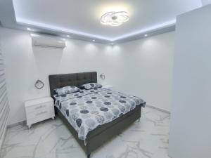 Postel nebo postele na pokoji v ubytování Apartman Viktor
