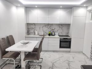 Kuchyň nebo kuchyňský kout v ubytování Apartman Viktor