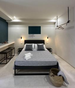 Postel nebo postele na pokoji v ubytování D'Aleammare - Rooms