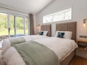 Voodi või voodid majutusasutuse Corning Mill View toas