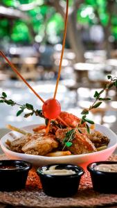 a plate of food with a tomato on top of it at Sheriff, Olympos in Kumluca