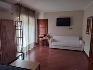 Postel nebo postele na pokoji v ubytování B&B CasaBuddace