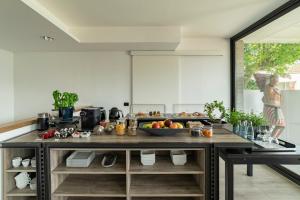 a kitchen with a counter with fruit on it at B&B Vista Lago in Como