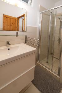 Koupelna v ubytování Bungalow Musuri