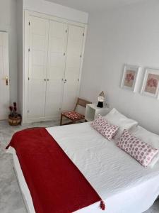 Ένα ή περισσότερα κρεβάτια σε δωμάτιο στο Apartamento Any en Rota +9 φωτογραφίες