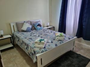 Postel nebo postele na pokoji v ubytování Angola Apartment B