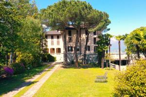 an exterior view of a house with a yard at Wonderful Stresa apartment in Stresa