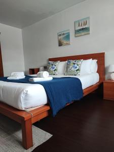 Un pat sau paturi într-o cameră la CarreraHouses Campito