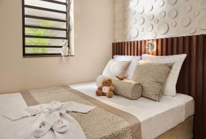 Letto o letti in una camera di Palm Hotel & Spa