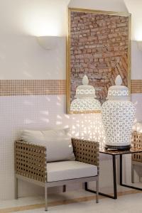 Uma área de estar em NARUTIS Hotel - Small Luxury Hotels of The World