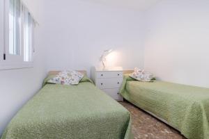 Postelja oz. postelje v sobi nastanitve Casa de los aguacates entre Marbella, Estepona y Benahavis
