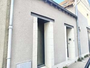 Budova, v ktorej sa apartmán nachádza + 4 fotografie