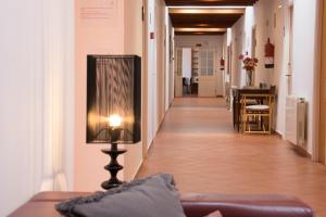 Grupoandria El Claustre de Ciutadella - HOSPEDERIA的休息区