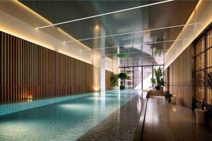 a large swimming pool in a building with a lobby at Elegant 1B apt in central Melbourne w unreal view#PA4303 in Melbourne