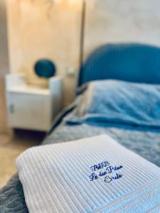 Postel nebo postele na pokoji v ubytování Le due palme Bed & Breakfast