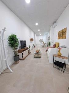 Televízia a/alebo spoločenská miestnosť v ubytovaní Moderno apartamento 4 en Calle Mármoles