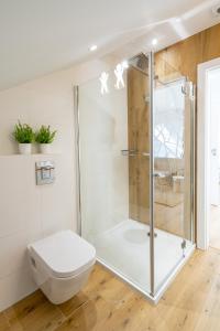 Kúpeľňa v ubytovaní Apartamenty Defala i Strefa Relaksu Natural Touch