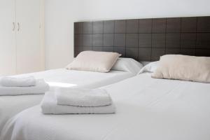 Postel nebo postele na pokoji v ubytování Grupoandria Hotel Platja Gran