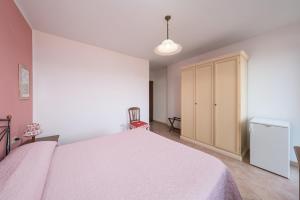 Postel nebo postele na pokoji v ubytování Agriturismo Daniela