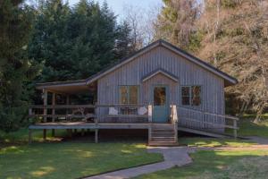 Casa grande con porche y terraza en Ben Macdui, en Banchory