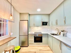 Kuchnia lub aneks kuchenny w obiekcie Alvarito Beach - EaW Homes