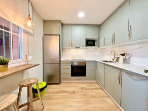 Kuchnia lub aneks kuchenny w obiekcie Alvarito Beach - EaW Homes