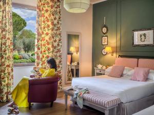 A bed or beds in a room at San Giovanni Terme Rapolano