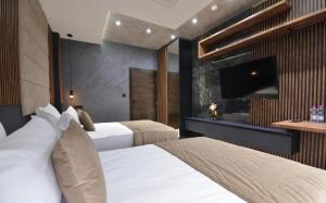 Postel nebo postele na pokoji v ubytování Spa Resort & Hotel Vrnjačke Terme