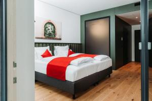 Posteľ alebo postele v izbe v ubytovaní Hotel & Restaurant Das Grambacher - Free Parking - Self Check-In