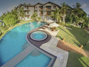 an overhead view of a swimming pool at a resort at Amaranthe Bay Resort & Spa in Trincomalee
